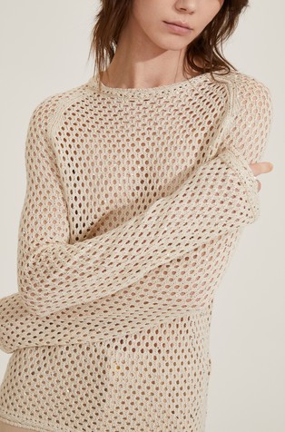 Rupičasto pleten pulover sa šljokicama