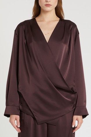 Loose satin blouse with wrap front