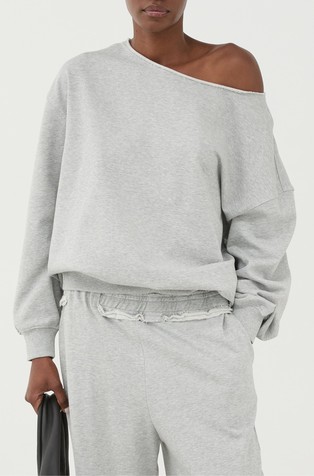 Pamučni pulover s otvorenim ramenom