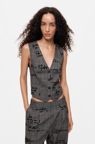 Checked vest with inscription