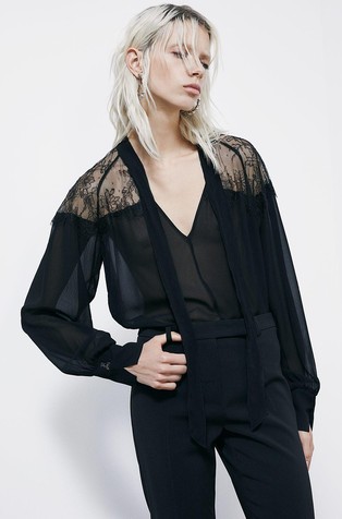 Sheer blouse with lace and bow
