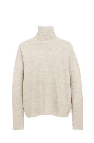 Pleten vuneni pulover s visokim ovratnikom