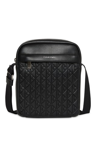 Reporter torba s uzorkom utisnutih logotipa