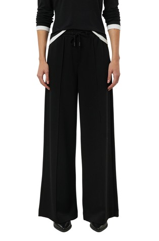 Jersey hlače s elastičnim obrubom oko struka i širokim nogavicama