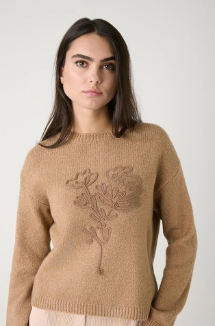 Sweater with floral appliqué