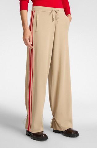 Široke pletene hlače s kontrastnim prugama