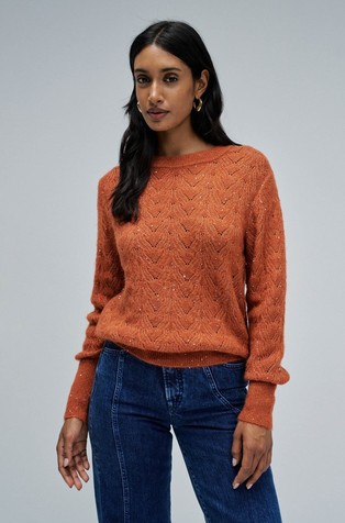 Pleten pulover s rupičastim uzorkom i šljokicama