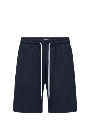 Relaxed fit cotton shorts in waffle texture