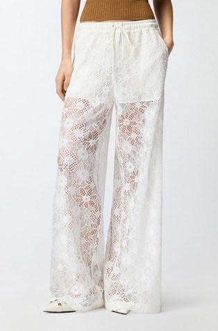 Trousers in floral embroidered lace