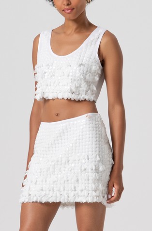 Mini suknja sa šljokicama i cvjetnim aplikacijama