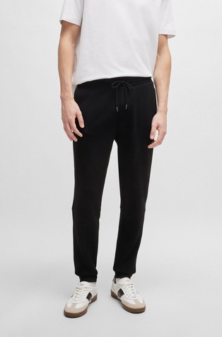 Pamučni donji dio trenirke s logo našivkom