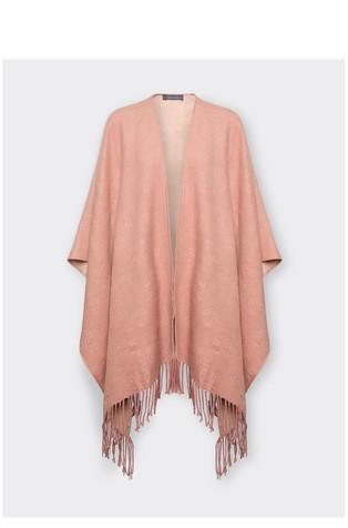 Reversible poncho with monograms and fringes