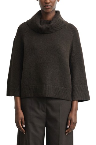 Poncho-style sweater with a wide turtleneck collar