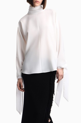 Oversized blouse in crepe with tie cuffs