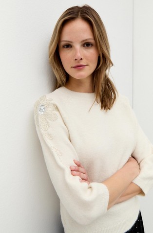 Sweater with glittering appliqué