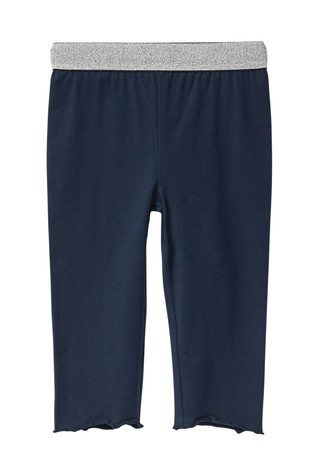 Kapri tajice sa svjetlucavim obrubom oko struka i valovitim rubom