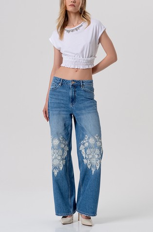 Zvonaste jeans hlače s vezovima i ispranim izgledom