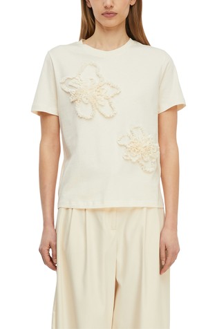 Majica s cvjetnom aplikacijom