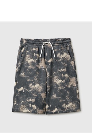 Over-fit Bermuda shorts in printed fleece