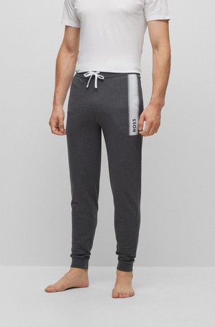 Pamučni donji dio trenirke s logotipom i prugom