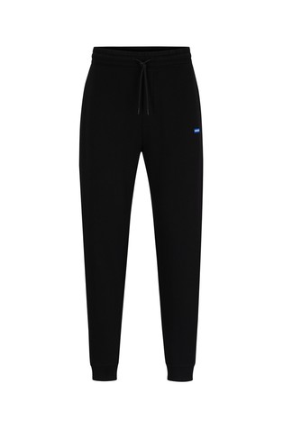 Pamučni donji dio trenirke s frotirnom unutrašnjošću i logo našivkom