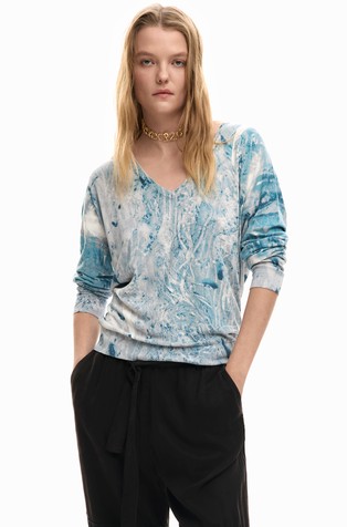 Pleten pulover s V-izrezom i apstraktnim uzorkom